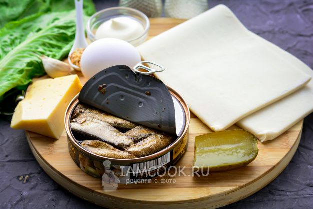 Ракушки из слоеного теста: новогодняя закуска с шпротами на скорую руку