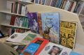 100 уникальных книг получила в дар Национальная библиотека имени Доможакова