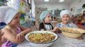 Детки из Хакасии выращивают на клумбе детского сада чай для бойцов